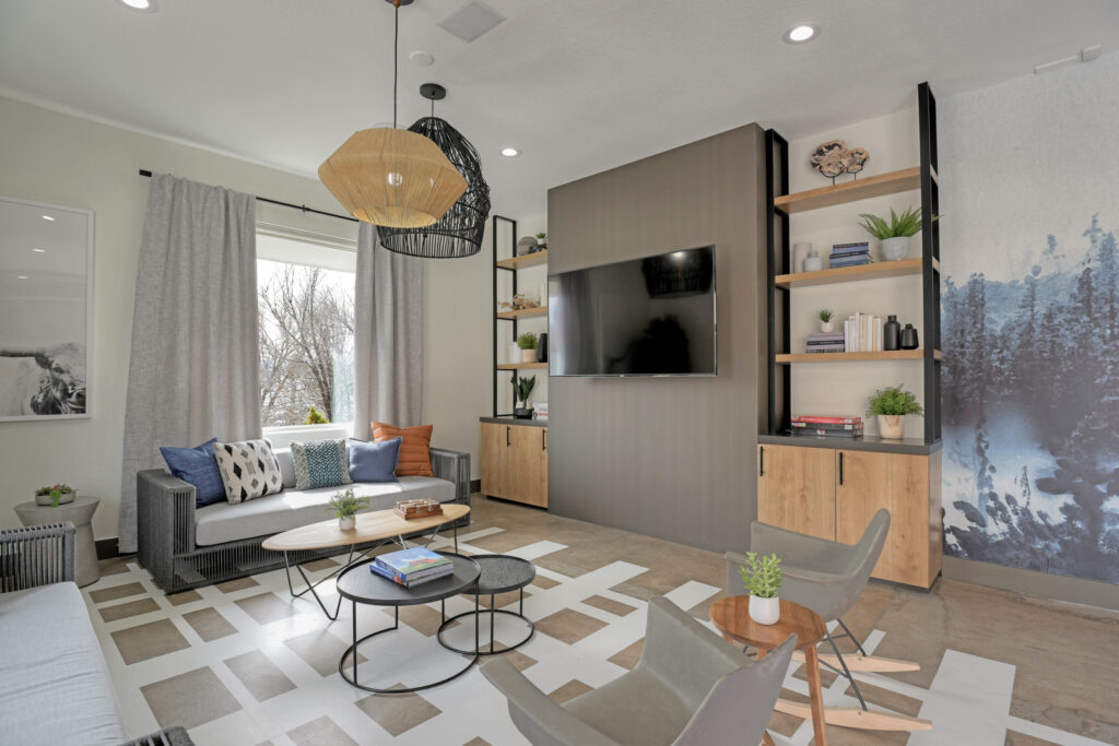 Clubhouse lounge with sofas and TV