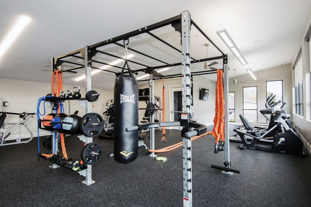 Fitness center with punching bag at Greenwood Point pet friendly apartments in Englewood