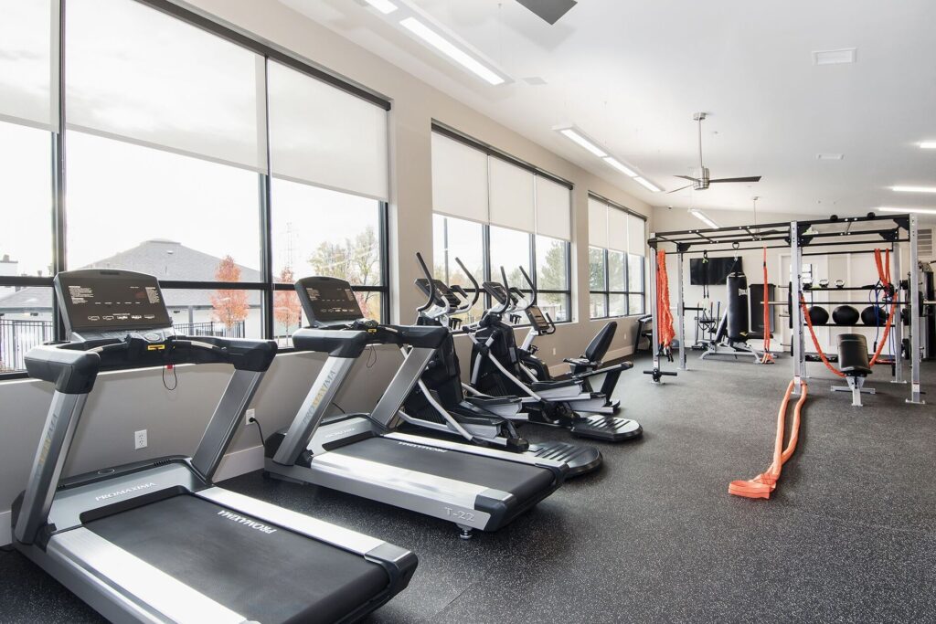 Fitness center with cardio machines and functional training equipment