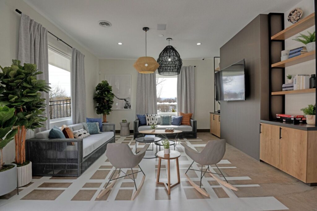 Clubhouse lounge with sofas and TV