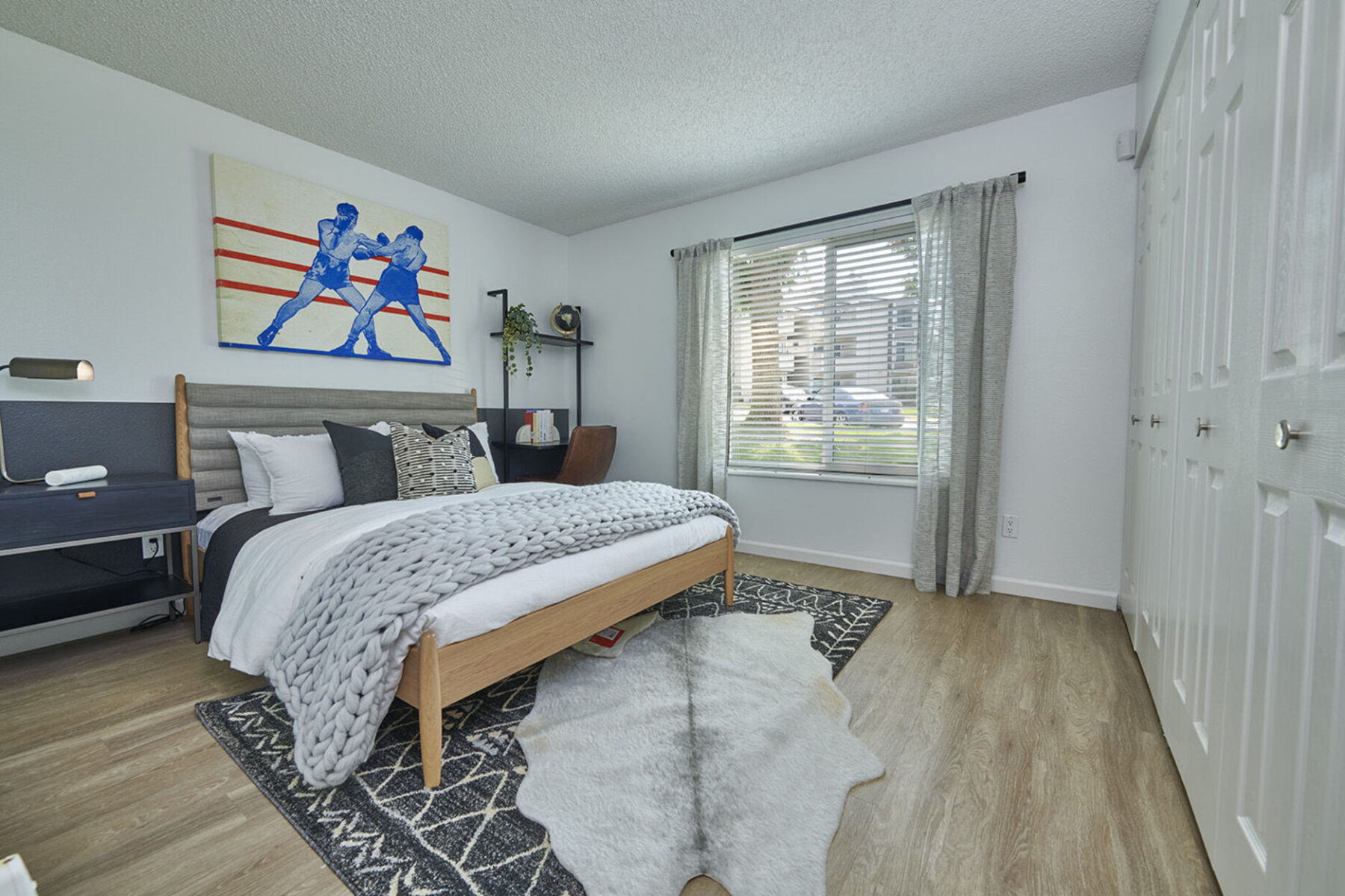 Staged bedroom with large window